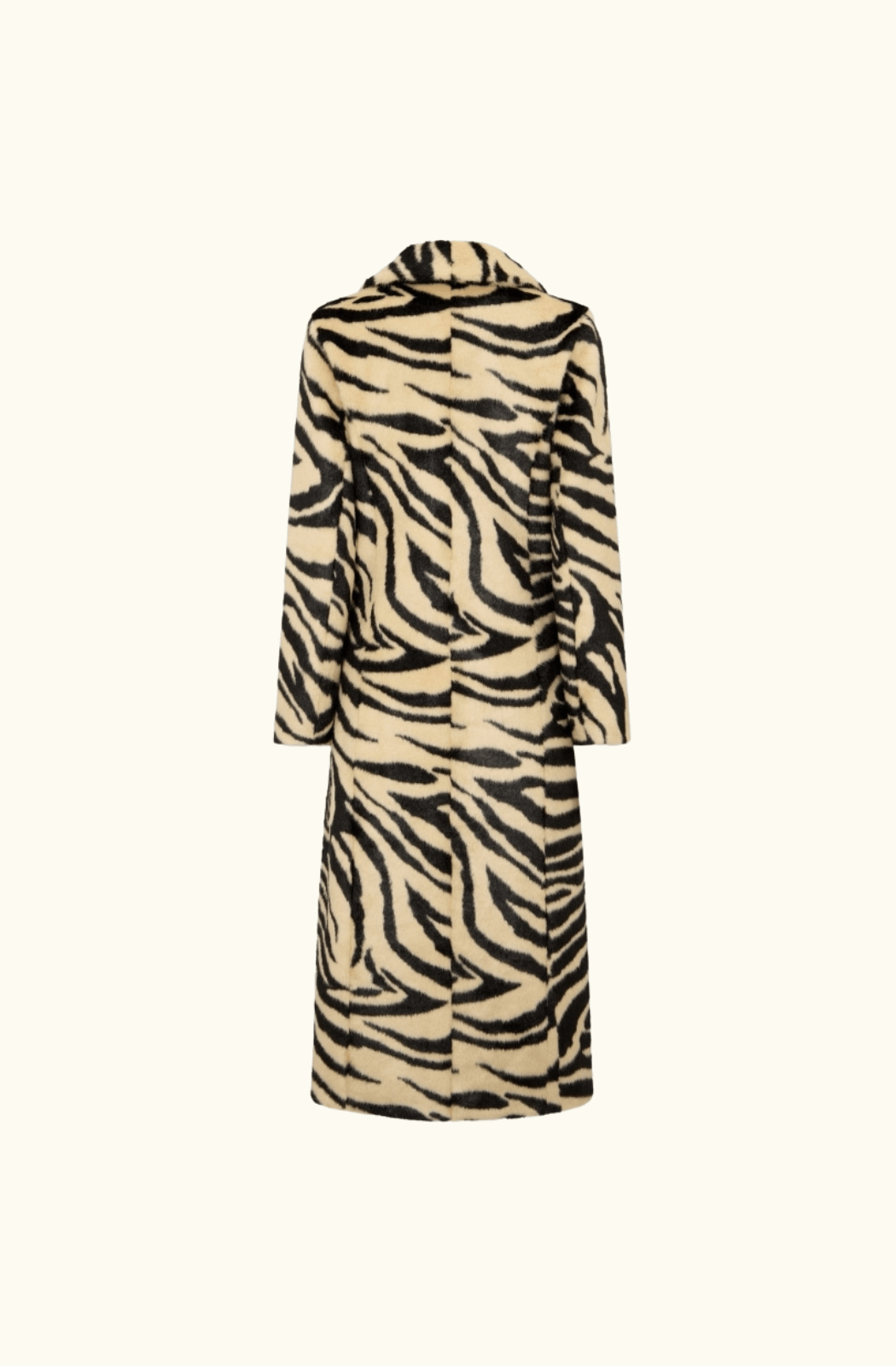 Back view of the Charlotte Simone 'Nora' longline coat showcasing its striking zebra print design, with a smooth, sleek cut and impeccable faux fur detailing.