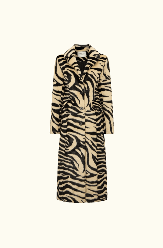 Front view of the Charlotte Simone 'Nora' longline coat in bold zebra print faux fur, featuring a button-up design, slim-fitting silhouette, and a luxurious finish with a tailored collar.