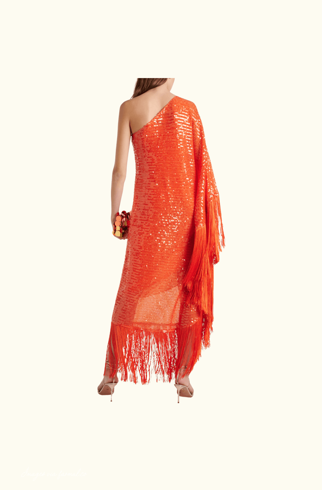 Side profile of the Spritz Disco Maxi Dress highlighting the draped silhouette and shimmering sequins.